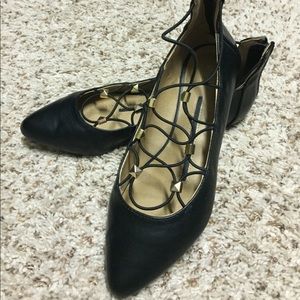 Point toe black flats